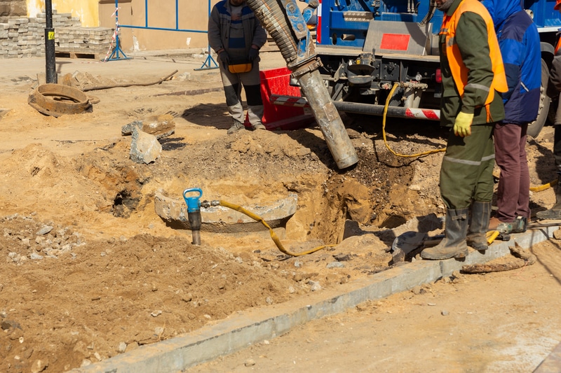 The excavation of earth using a suction excavator